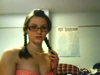 Pretty brunette playing with her tits